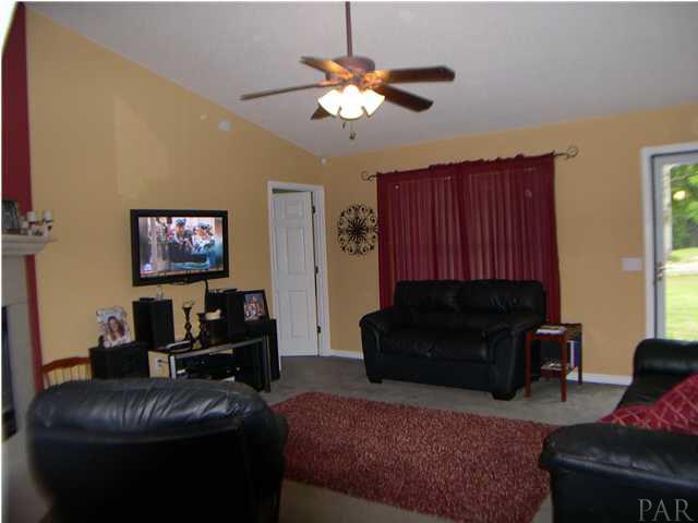 7445 Johnson Road Milton, FL 32583 - Photo 3 of 17 Great room view from dining room