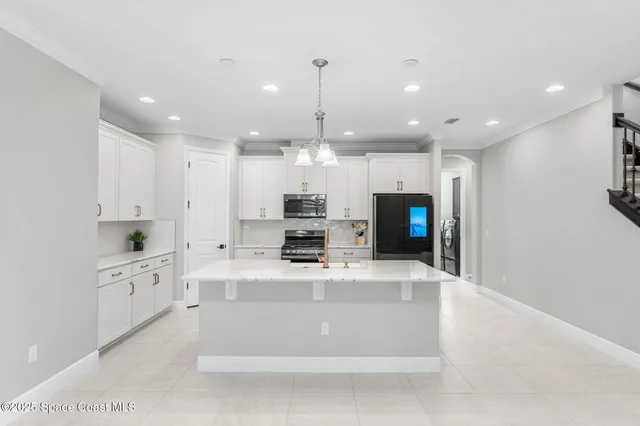 $912,975 | 8403 Catalissa Avenue, Melbourne, FL 32940