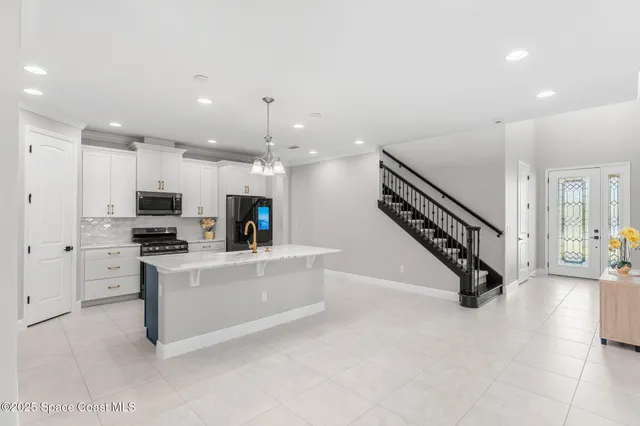 $912,975 | 8403 Catalissa Avenue, Melbourne, FL 32940