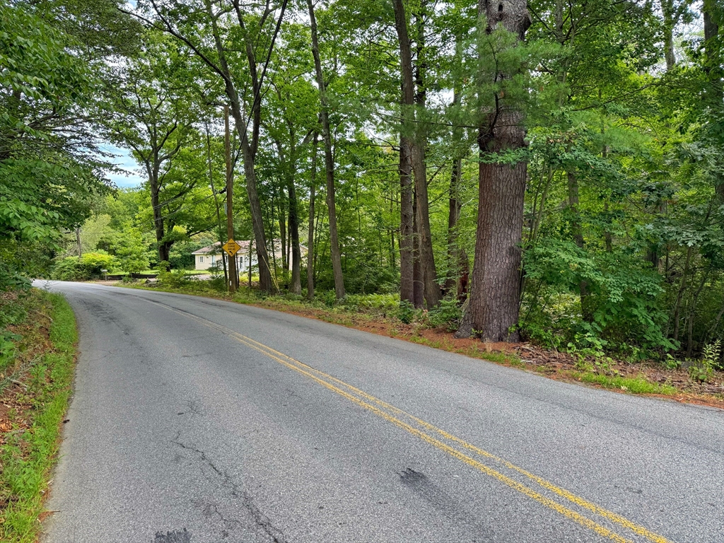 64 Seabrook Road Salisbury, MA 01952 - Photo 2 of 3 a road view from a balcony