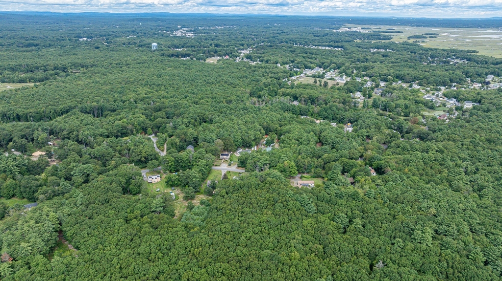 64 Seabrook Road Salisbury, MA 01952 - Photo 3 of 3 a view of a city with lush green forest