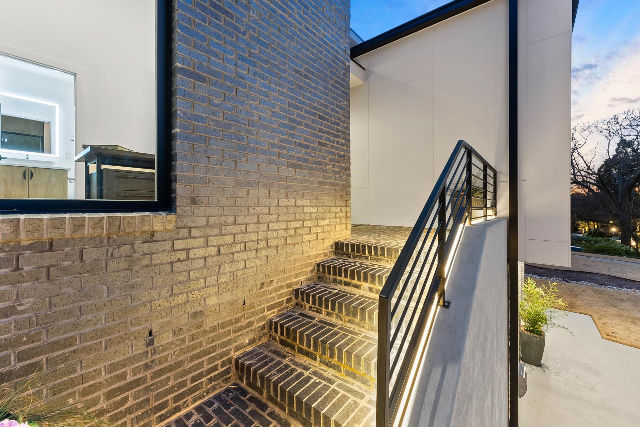 2511 Stafford Avenue Raleigh, NC 27607 - Photo 70 of 74 A welcoming introduction to an extraordinary home Spectacular Front Stairs