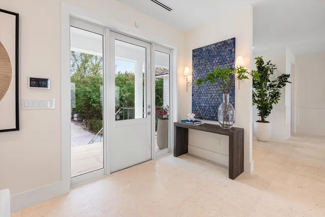 a bathroom with a tub sink and a window