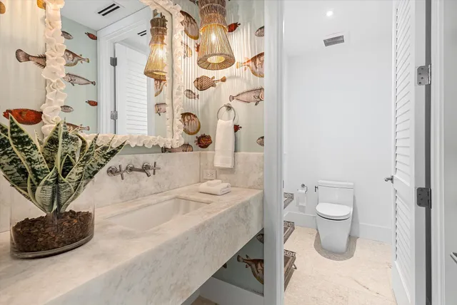 a bathroom with a double vanity sink a mirror and a shower