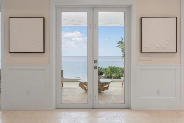 a bedroom with a bed dresser and a window