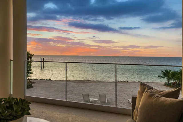 a view of a house with a backyard and a garden