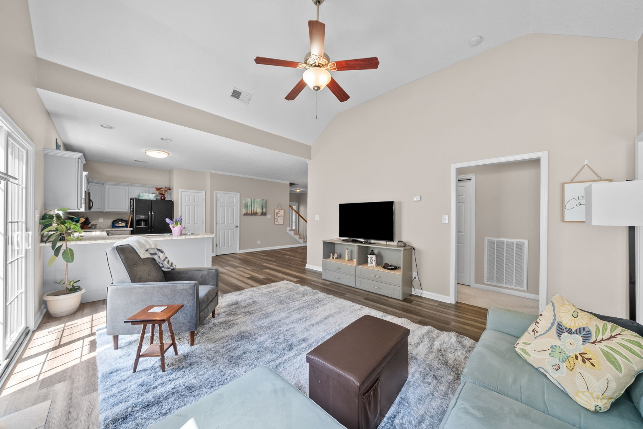 3737 Meadow Ridge Lane Clarksville, TN 37040 - Photo 12 of 32 a living room with furniture and a flat screen tv