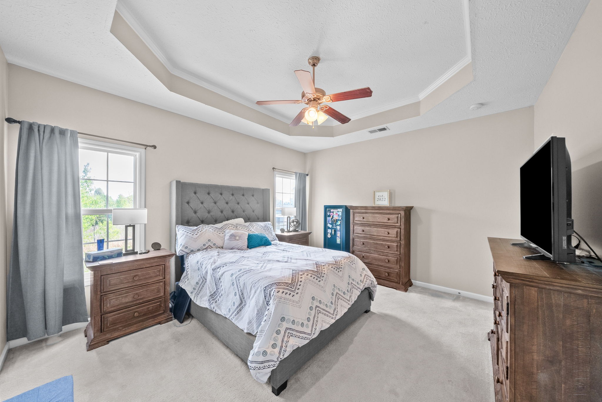 3737 Meadow Ridge Lane Clarksville, TN 37040 - Photo 16 of 32 a bedroom with a bed and a flat screen tv