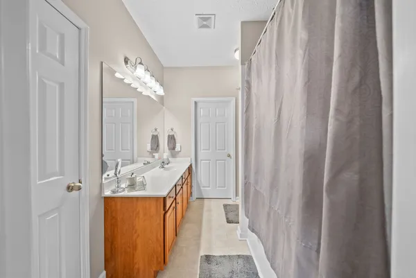 a very nice looking room with a shower