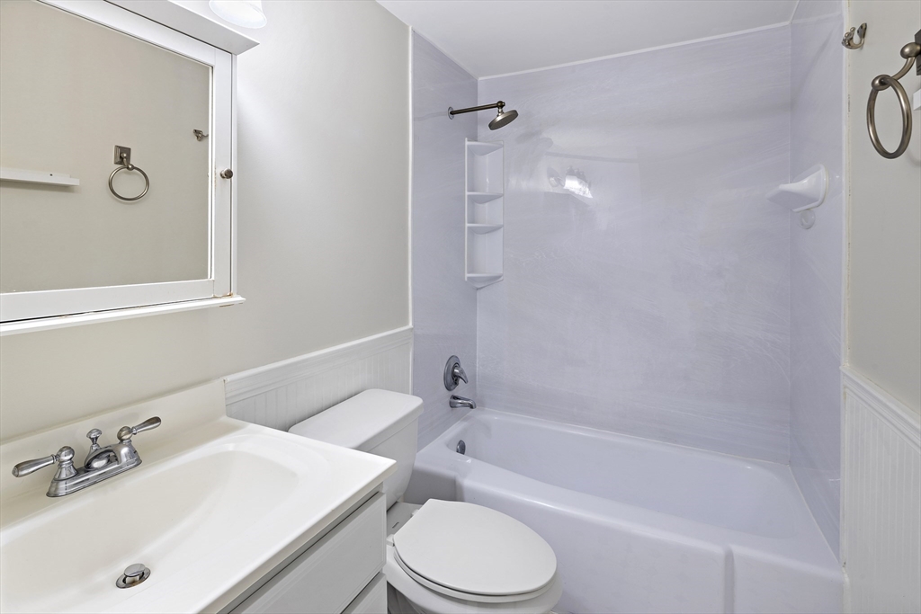 49 Worcester Street, Unit 4 Boston, MA 02118 - Photo 13 of 19 a bathroom with a sink toilet and shower