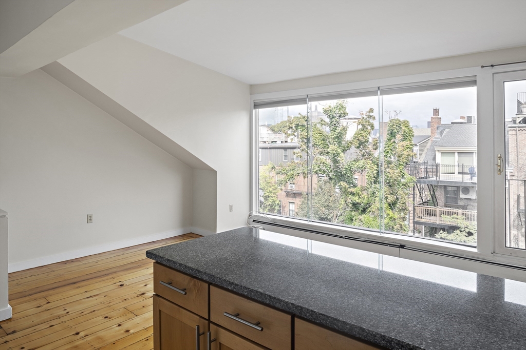 49 Worcester Street, Unit 4 Boston, MA 02118 - Photo 8 of 19 a view of a room that has a window in it