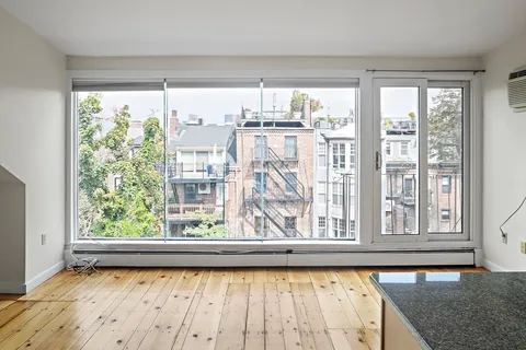 a view of a large window with an outdoor view