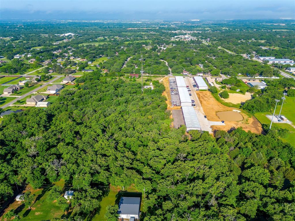 12279 J Rendon Road Burleson, TX 76028 - Photo 4 of 6 an aerial view of residential houses with outdoor space and trees