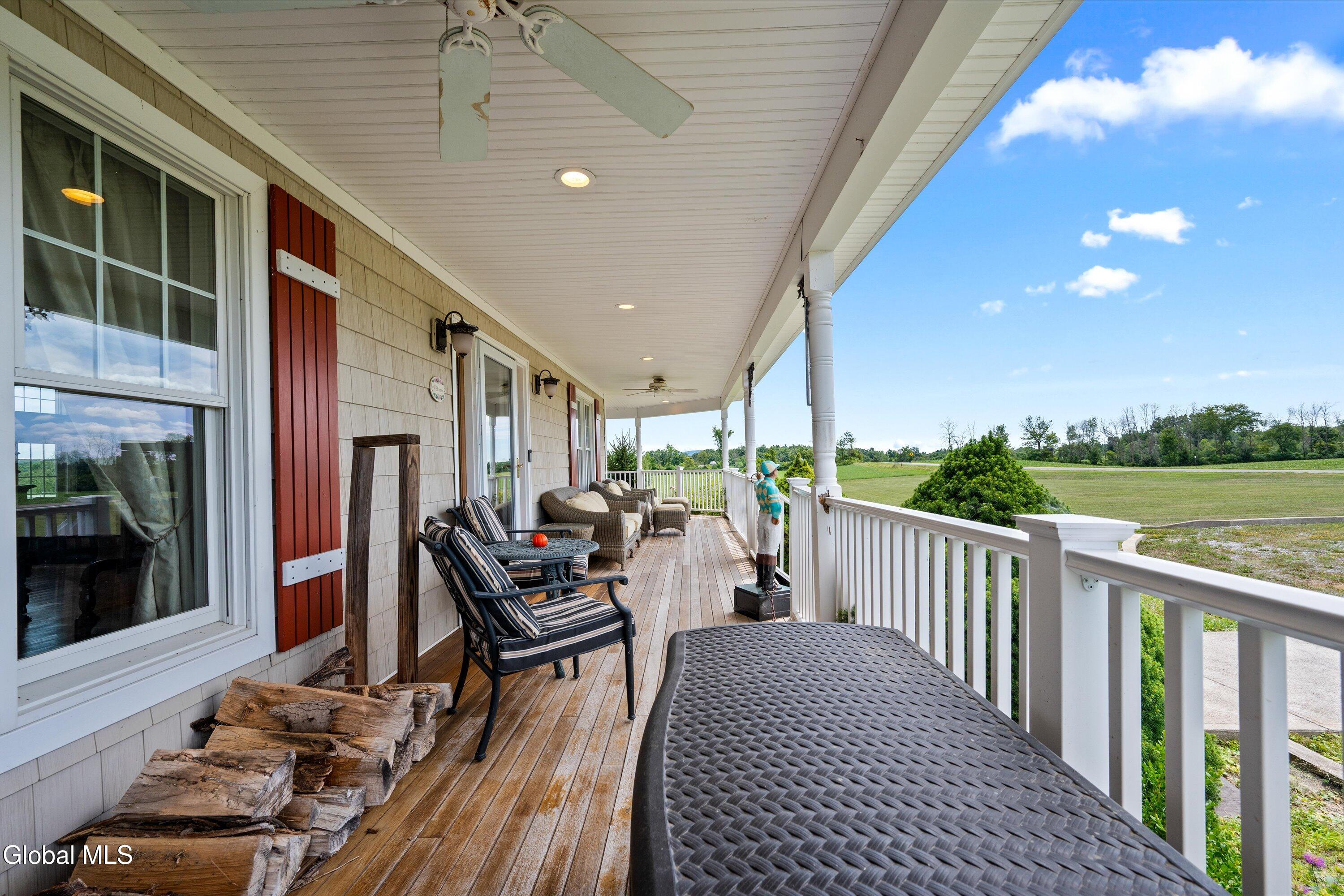85 Harris Road Northumberland, NY 12871 - Photo 44 of 46 Wrap aroung porch