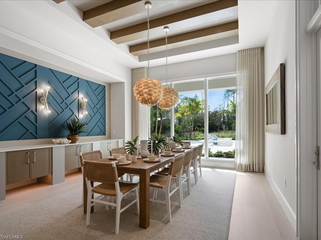 6730 Sable Ridge Lane Naples, FL 34109 - Photo 12 of 50 a view of a dining room with furniture window and outside view