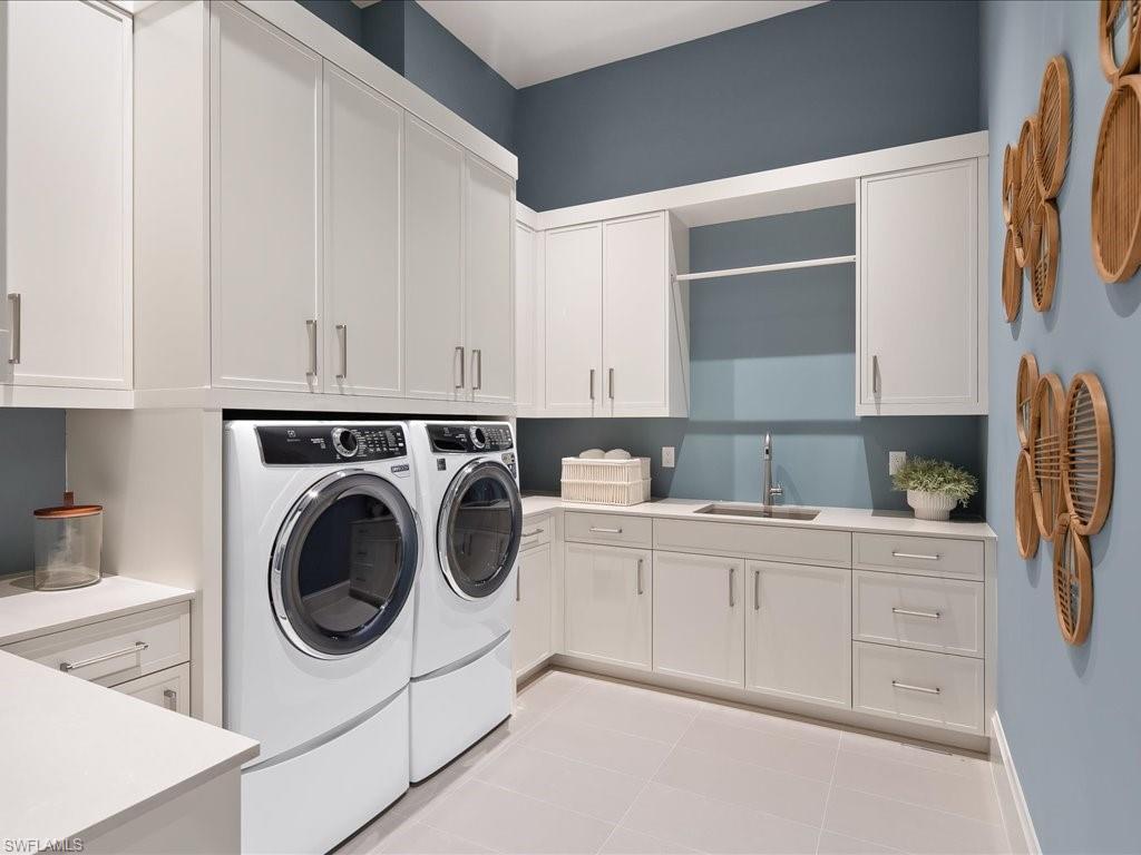 6730 Sable Ridge Lane Naples, FL 34109 - Photo 30 of 50 a utility room with sink dryer and washer