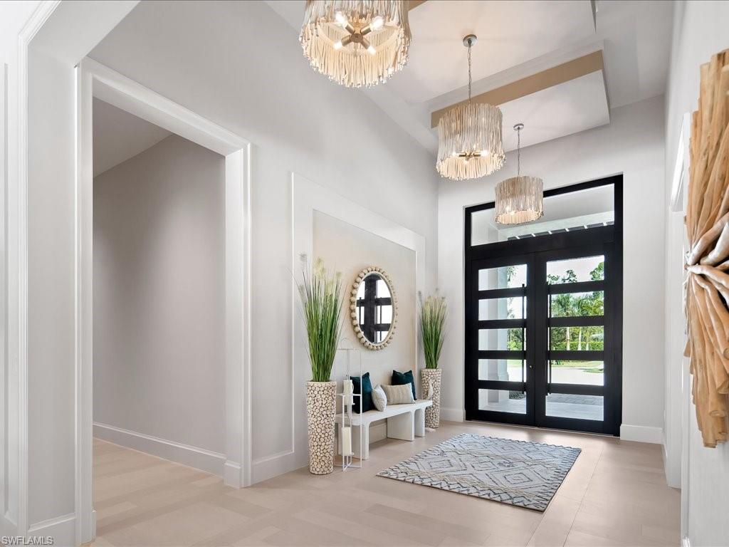 6730 Sable Ridge Lane Naples, FL 34109 - Photo 3 of 50 a view of a livingroom with a window