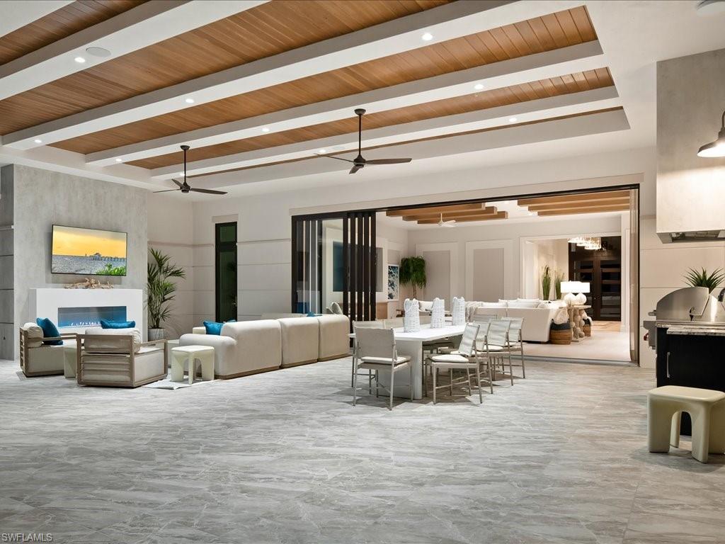 6730 Sable Ridge Lane Naples, FL 34109 - Photo 33 of 50 a living room with furniture