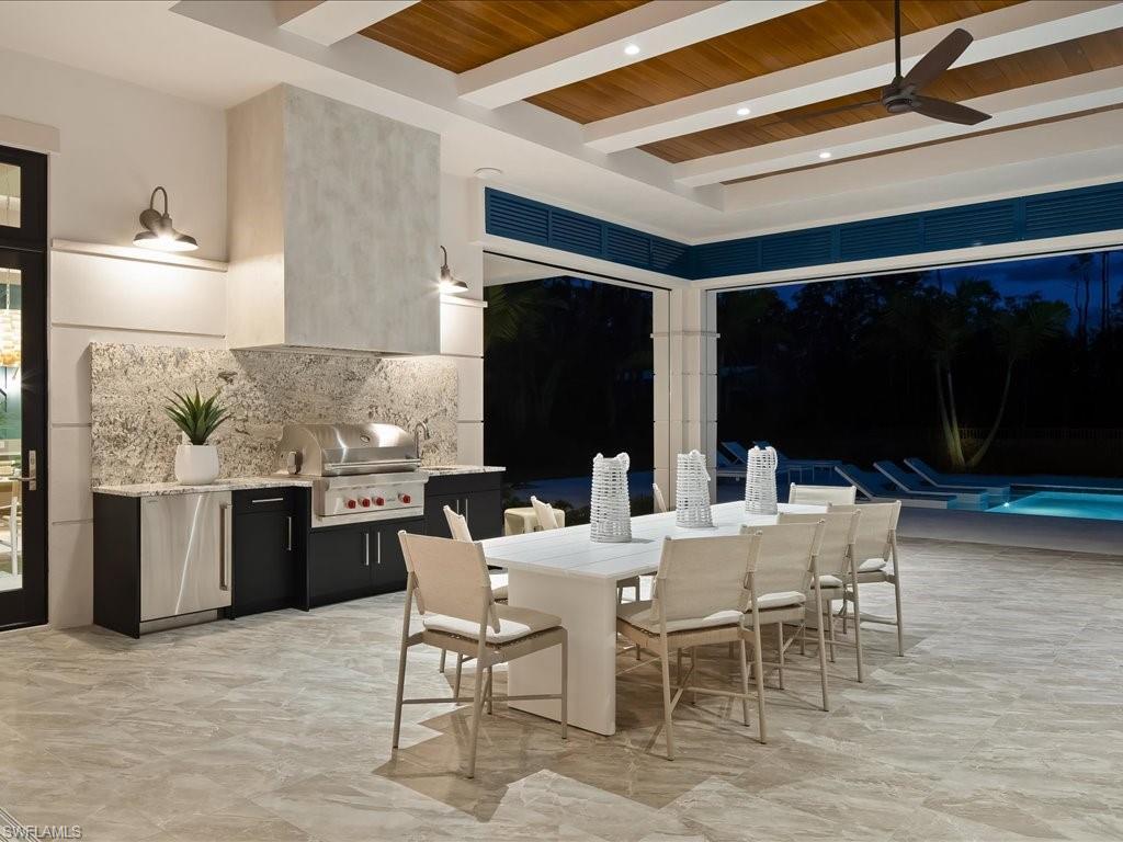 6730 Sable Ridge Lane Naples, FL 34109 - Photo 35 of 50 a view of a dining room with furniture