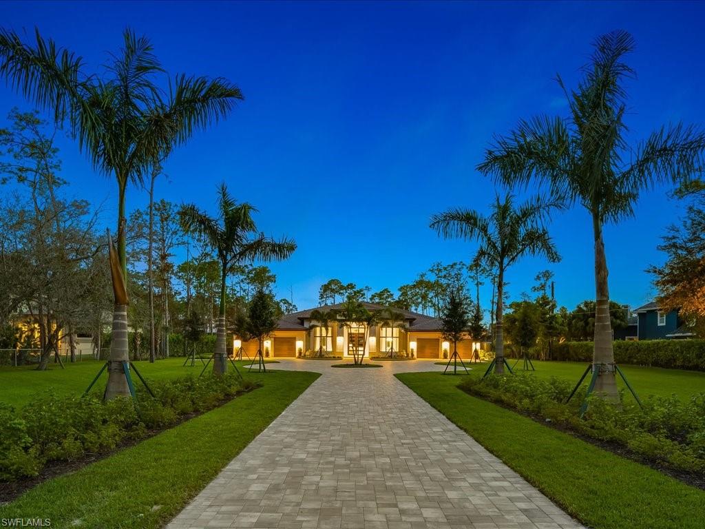 6730 Sable Ridge Lane Naples, FL 34109 - Photo 40 of 50 a view of a park with a palm tree