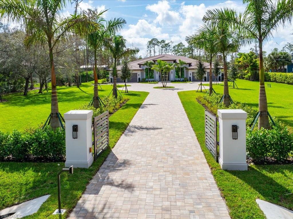 6730 Sable Ridge Lane Naples, FL 34109 - Photo 45 of 50 a view of a park with palm trees
