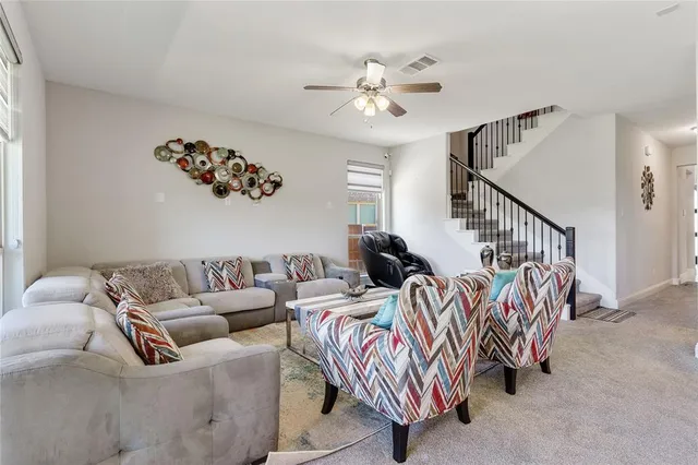 a bedroom with furniture and a couch