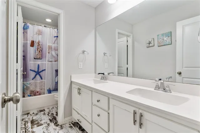 a room with furniture and a flat screen tv