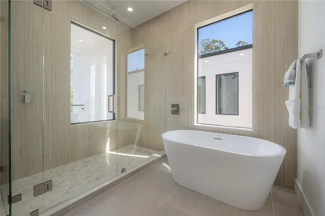 a bathroom with a granite countertop sink toilet and a mirror