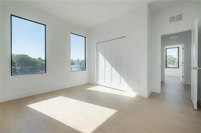 a outdoor living room with furniture and a potted plant