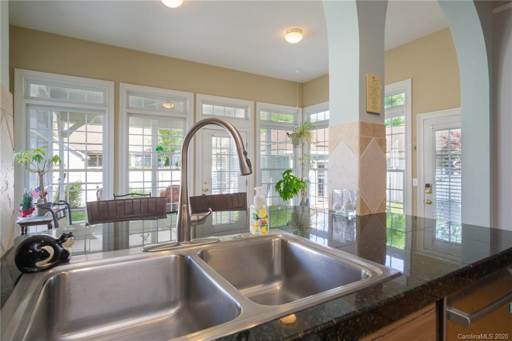 3236 Colonel Springs Way Fort Mill, SC 29708 - Photo 18 of 45 a view of a kitchen area with a living room