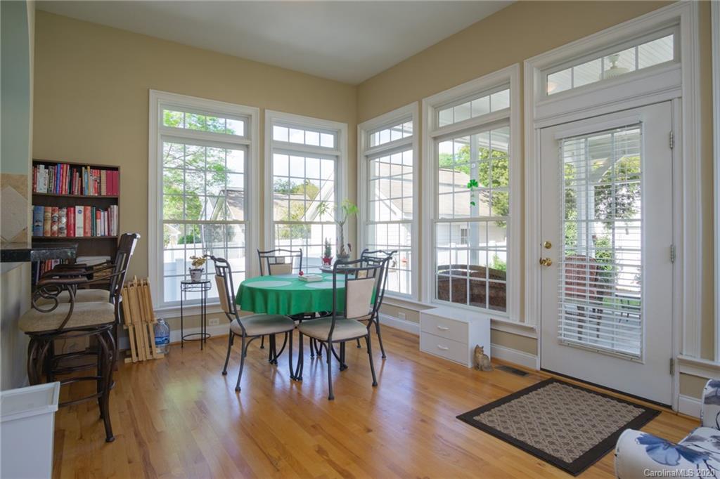 3236 Colonel Springs Way Fort Mill, SC 29708 - Photo 19 of 45 a view of a dining room with furniture window and wooden floor