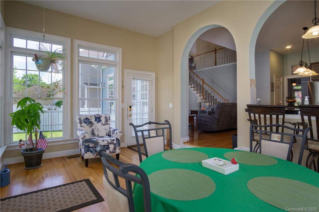 3236 Colonel Springs Way Fort Mill, SC 29708 - Photo 20 of 45 a living room with furniture and wooden floor