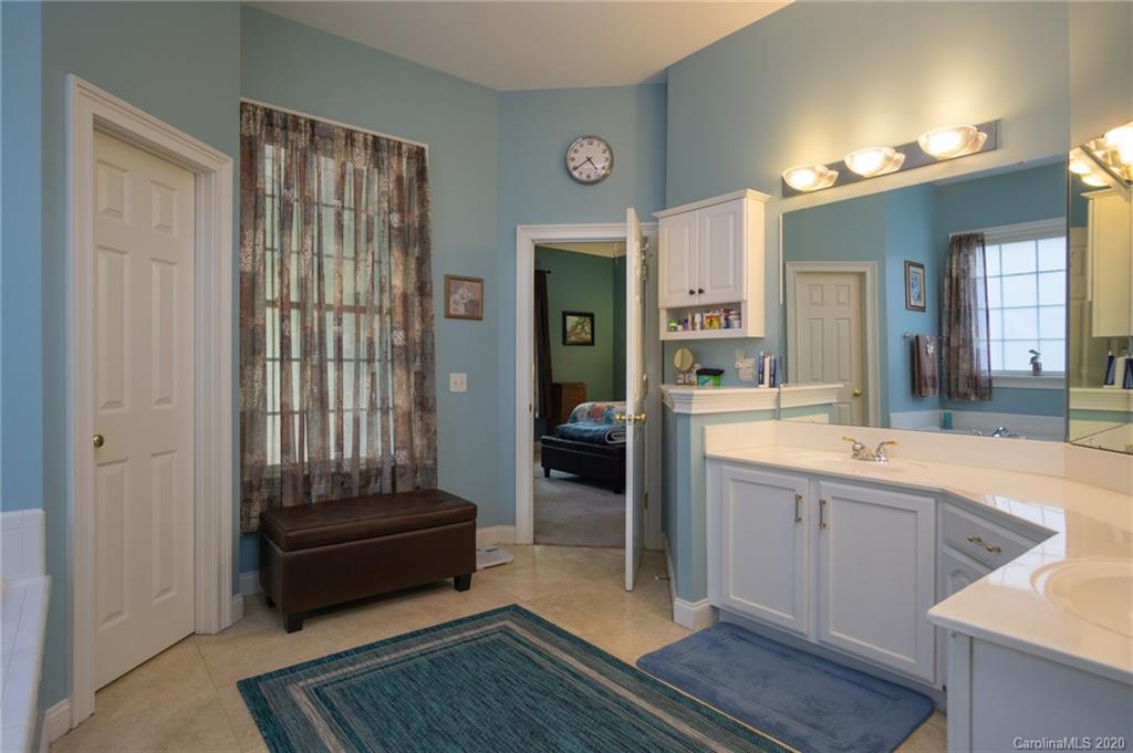 3236 Colonel Springs Way Fort Mill, SC 29708 - Photo 25 of 45 a spacious bathroom with a tub shower and sink