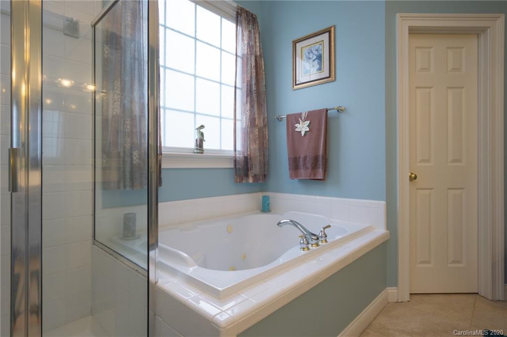 3236 Colonel Springs Way Fort Mill, SC 29708 - Photo 26 of 45 a white bath tub sitting next to a window