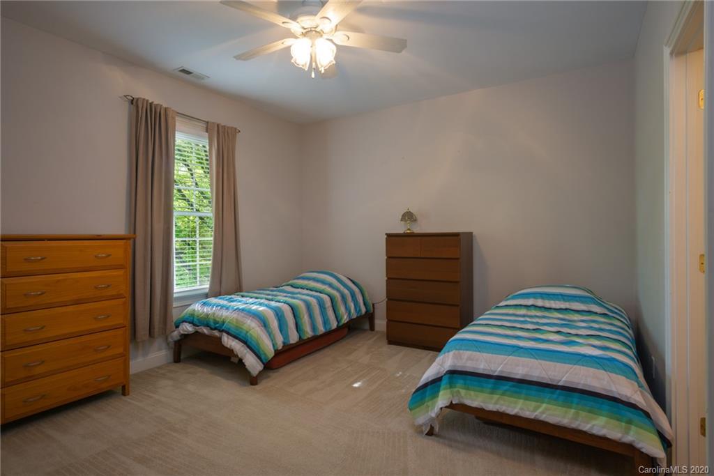 3236 Colonel Springs Way Fort Mill, SC 29708 - Photo 32 of 45 a bedroom with two beds and a dresser