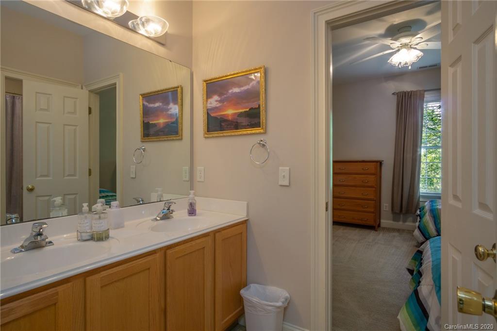 3236 Colonel Springs Way Fort Mill, SC 29708 - Photo 34 of 45 a bathroom with a double vanity sink toilet and shower