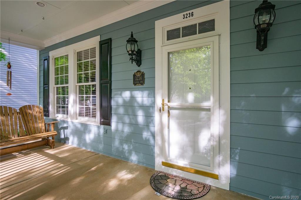 3236 Colonel Springs Way Fort Mill, SC 29708 - Photo 7 of 45 a view of a porch with a floor to ceiling window and wooden floor