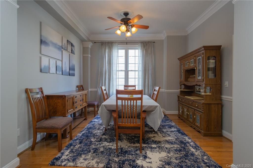 3236 Colonel Springs Way Fort Mill, SC 29708 - Photo 10 of 45 a living room with furniture and a chandelier