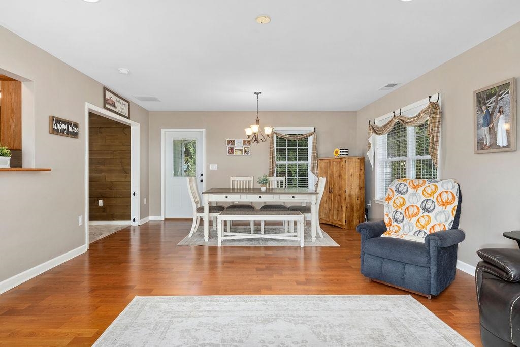 224 Inglecress Road Waynesboro, VA 22980 - Photo 11 of 42 a living room with furniture and a wooden floor