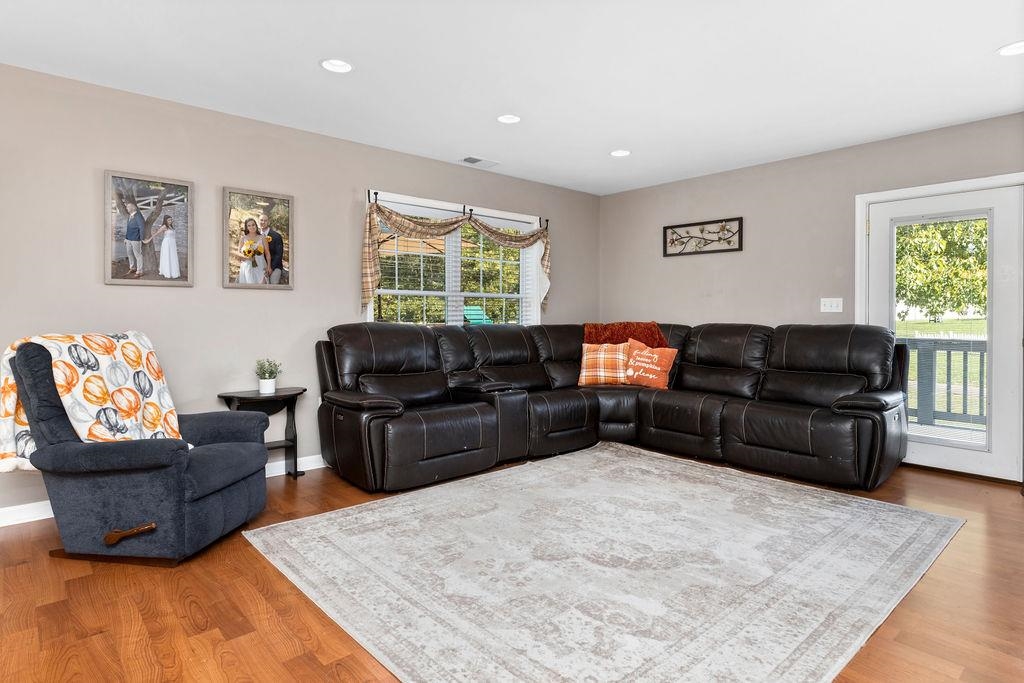 224 Inglecress Road Waynesboro, VA 22980 - Photo 14 of 42 a living room with furniture and a flat screen tv
