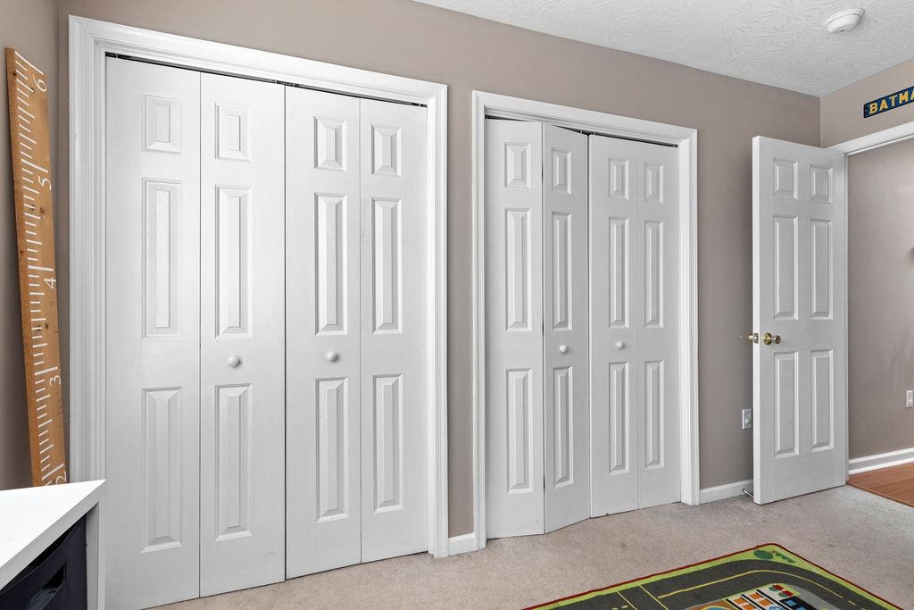 224 Inglecress Road Waynesboro, VA 22980 - Photo 24 of 42 a view of a bedroom with a wooden door