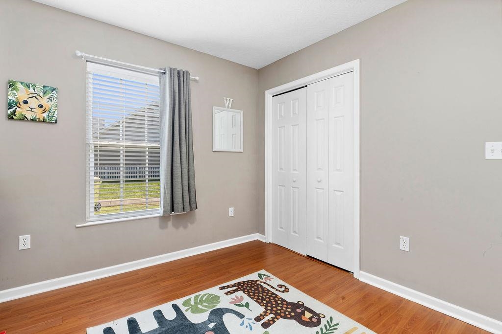 224 Inglecress Road Waynesboro, VA 22980 - Photo 26 of 42 a view of an empty room with wooden floor and a window