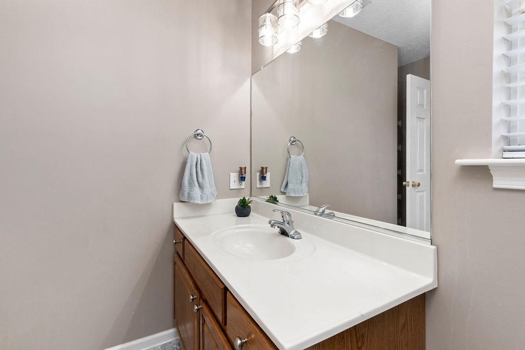 224 Inglecress Road Waynesboro, VA 22980 - Photo 28 of 42 a bathroom with a sink and a mirror