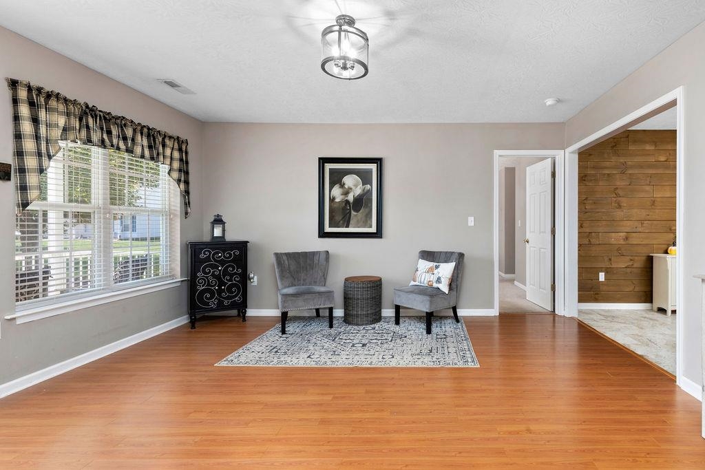 224 Inglecress Road Waynesboro, VA 22980 - Photo 3 of 42 a view of dining room with furniture window and wooden floor