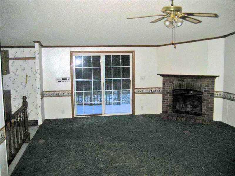 88 Howe Road Whitefield, ME 04353 - Photo 4 of 16 Living Room. with sliders to deck...