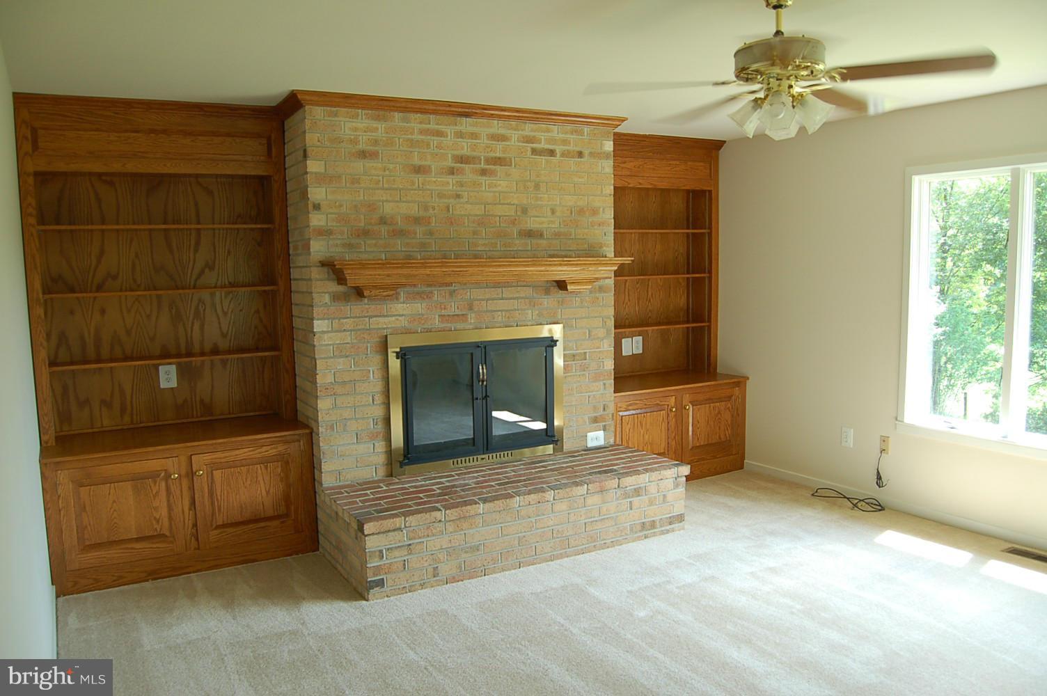 301 Storck Road Fredericksburg, VA 22406 - Photo 16 of 26 Family Room with wood burning FP