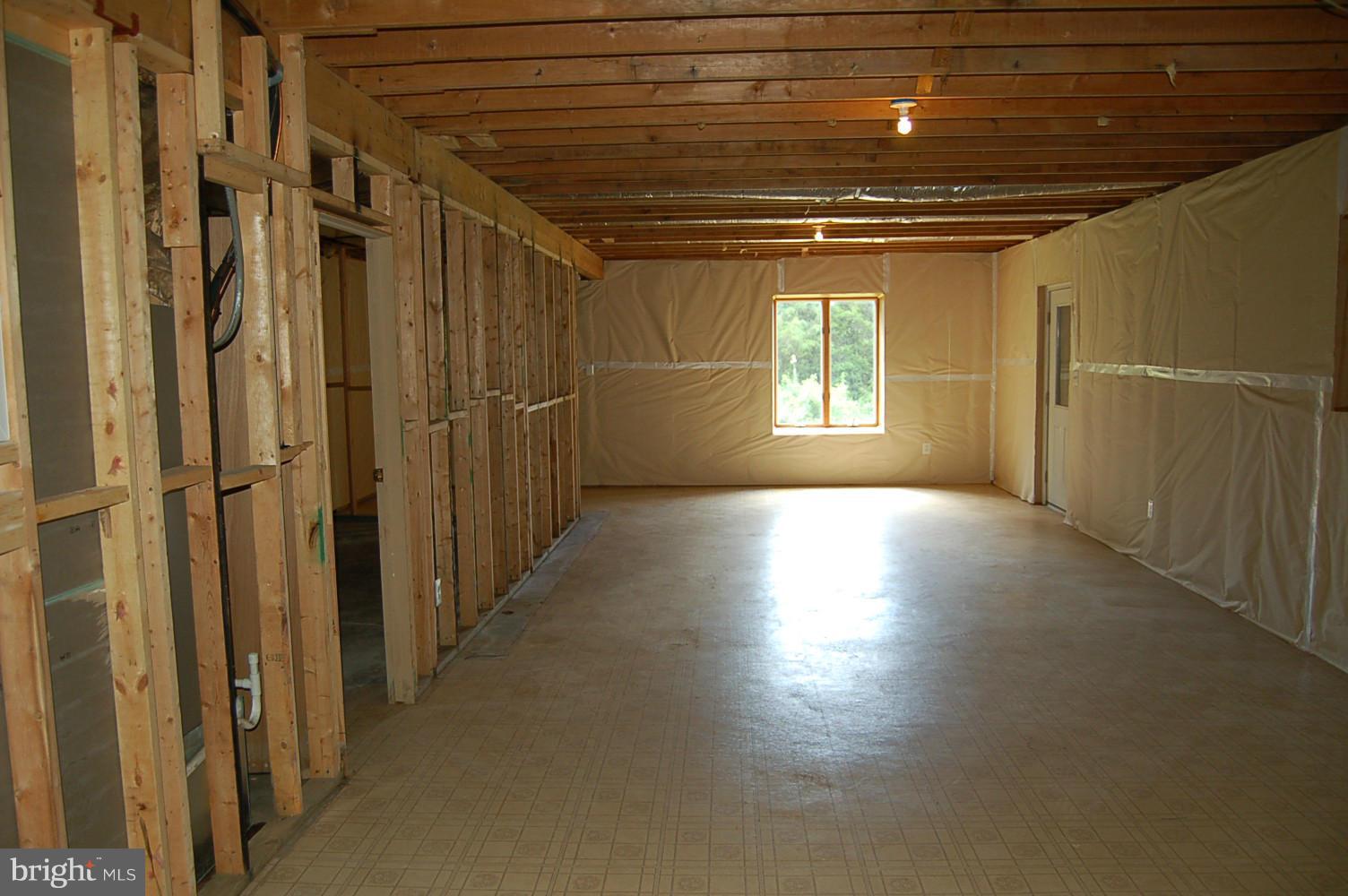 301 Storck Road Fredericksburg, VA 22406 - Photo 26 of 26 Basement Unfinished with Wood Stove