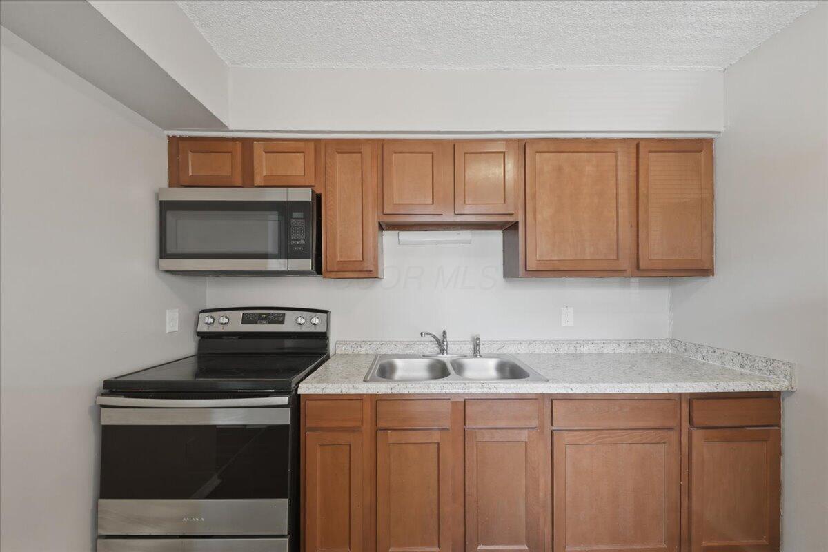 1928 Agler Road Columbus, OH 43224 - Photo 29 of 53 29-Kitchen 2F