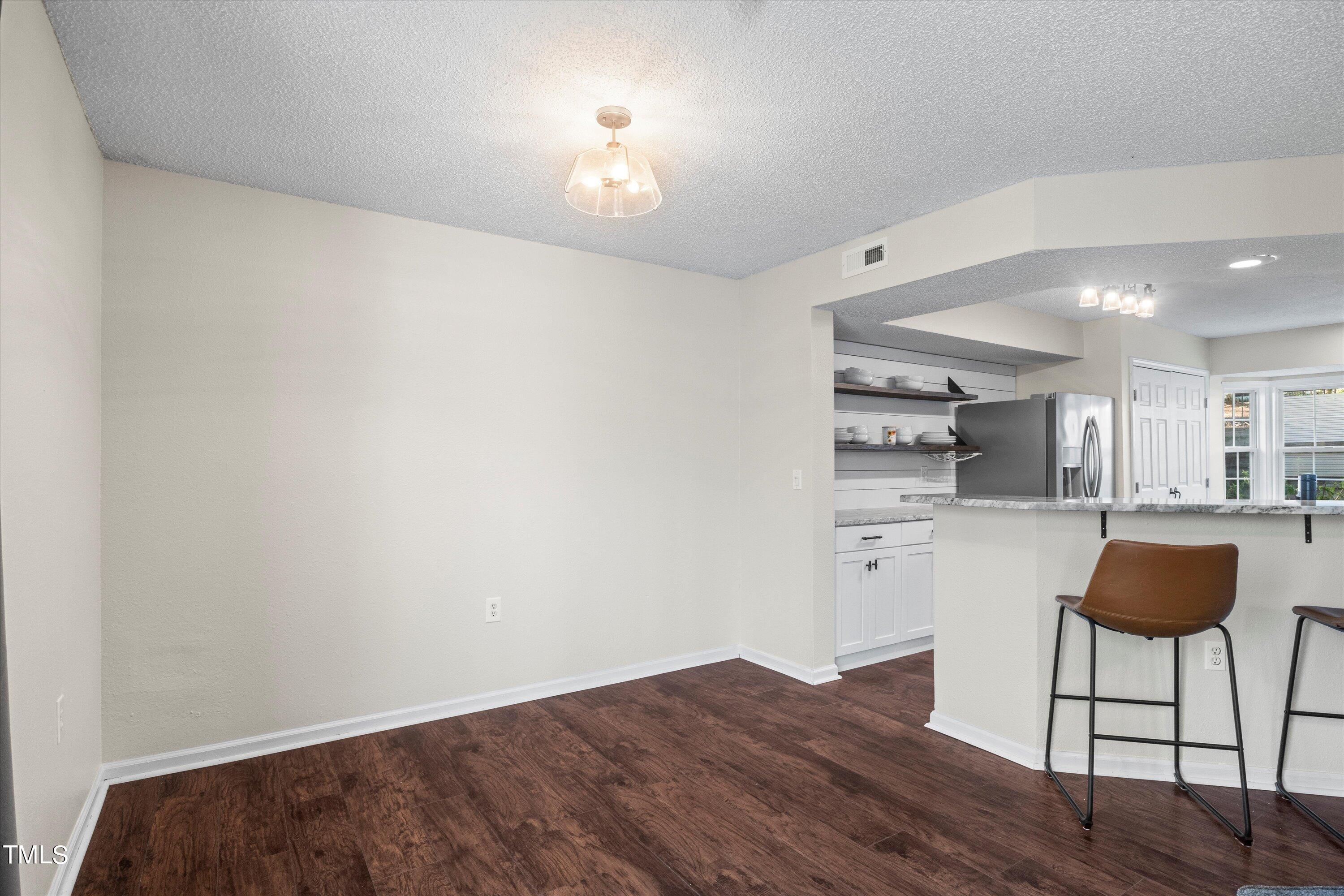 2443 Condor Court Raleigh, NC 27615 - Photo 10 of 31 Dining Room Open to the Kitchen
