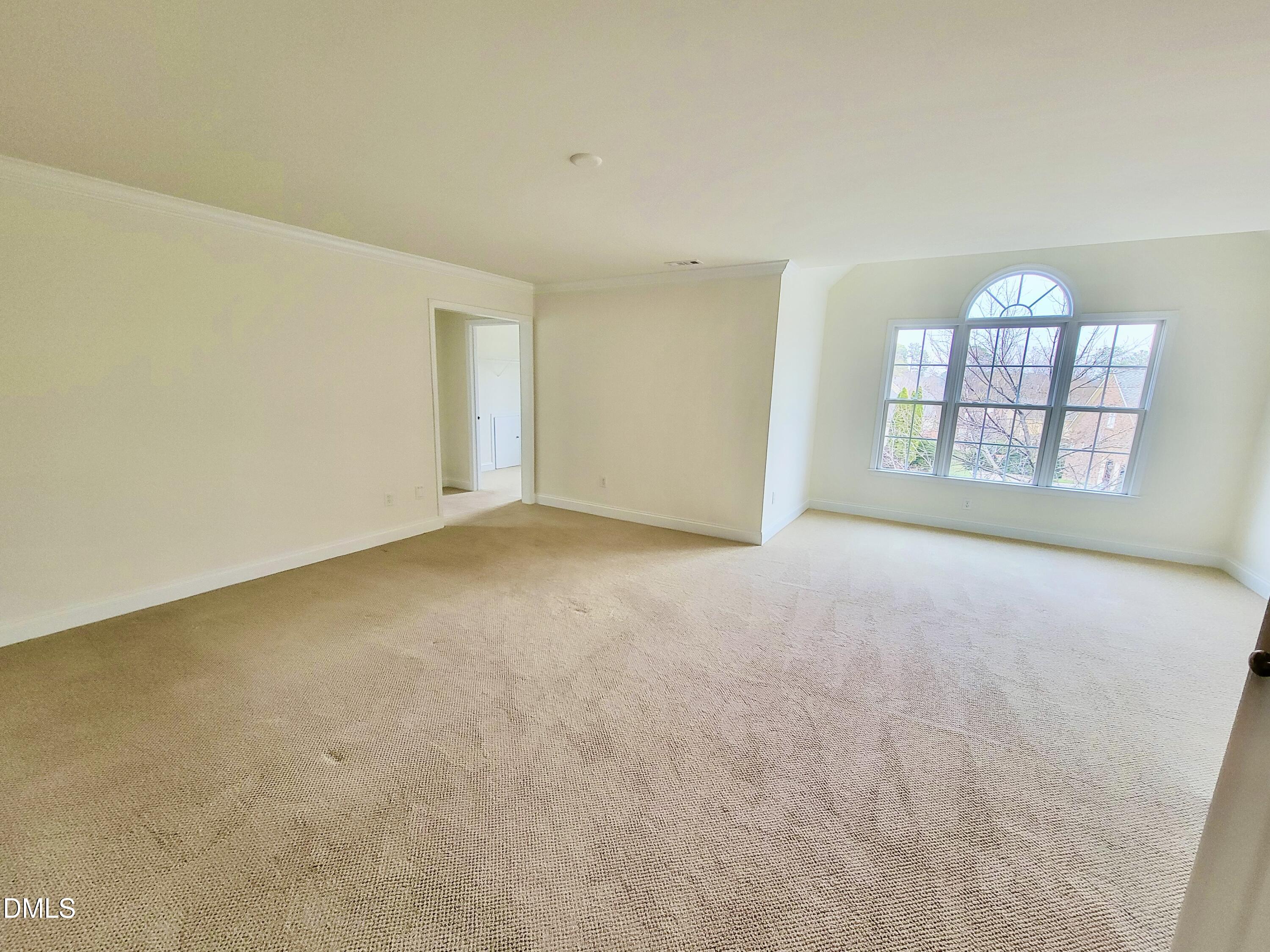 9441 Collingdale Way Raleigh, NC 27617 - Photo 24 of 54 an empty room with windows